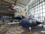 MOF_011 - in the foreground is a Grumman F9F-8 (F-9J) Cougar in the background is a Douglas A-4F Skyhawk II which was flown by the Blue Angels