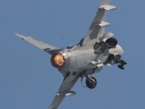 RIAT2006_057 - an F16 taking off tucking it's wheels in