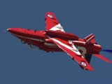 RIAT2006_079 - one of the Red Arrows nips past in an inverted flyby