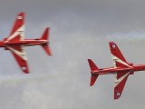 RIAT2009_180 - Red Arrows solos cross over - this was taken with one shot - not on continuous mode